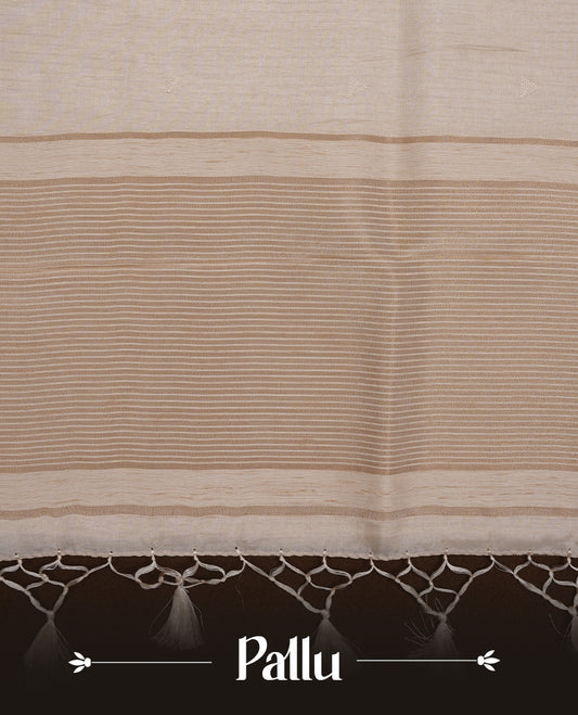 Beige colour Tussar silk saree featuring Elegant plain body, highlighting Grey colour Leaf cut work with Light gold zari border, pallu and paired with matching blouse piece.