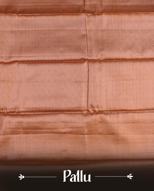 Rose gold colour semi tissue silk saree featuring gold zari motifs on body, self colour with copper zari traditional green simple border, paired with matching blouse piece.
