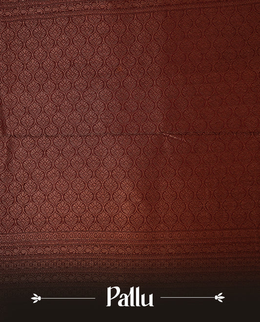 Rust orange colour softie silk saree featuring dot gold zari pattern across body, complemented by contrast chocolate brown with gold zari border, paired with matching blouse
