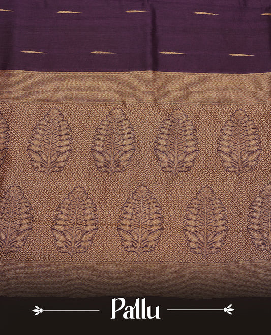 Grape colour semi banaras tussar georgette saree featuring antique gold zari buttas on body, temple pattern on border and floral pattern on pallu, paired with matching blouse piece.