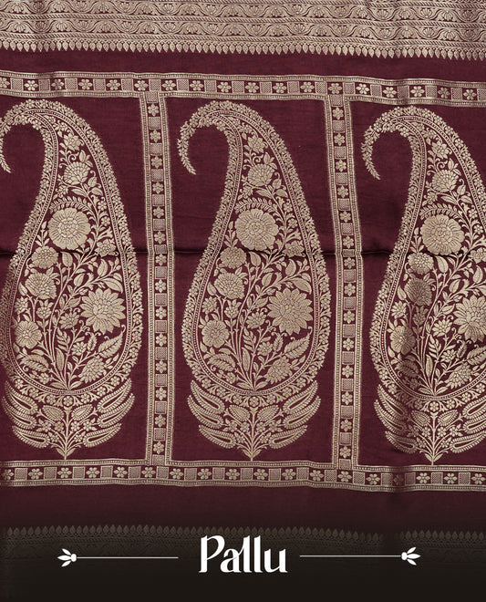 Maroon colour Banaras satin crepe silk saree featuring Plain body, associate with Gold zari traditional border, comes with matching blouse piece.