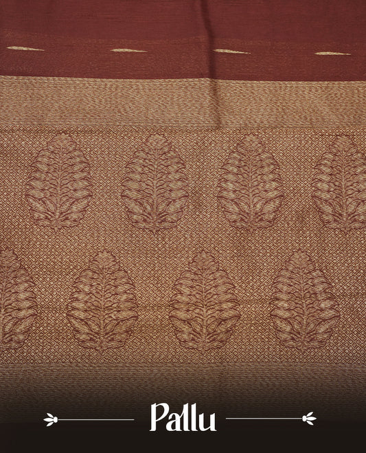 Chocolate Brown colour semi banaras tussar georgette saree featuring antique gold zari buttas on body, temple pattern on border and floral pattern on pallu, paired with matching blouse piece.