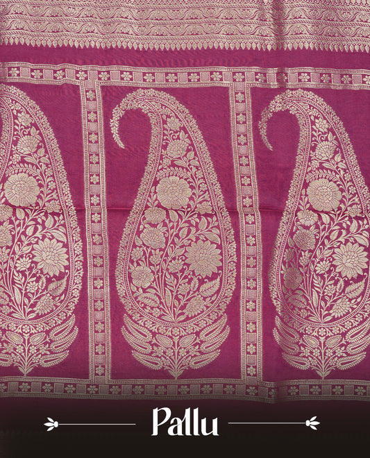 Magenta colour Banaras satin crepe silk saree featuring Plain body, associate with Gold zari traditional border, comes with matching blouse piece.