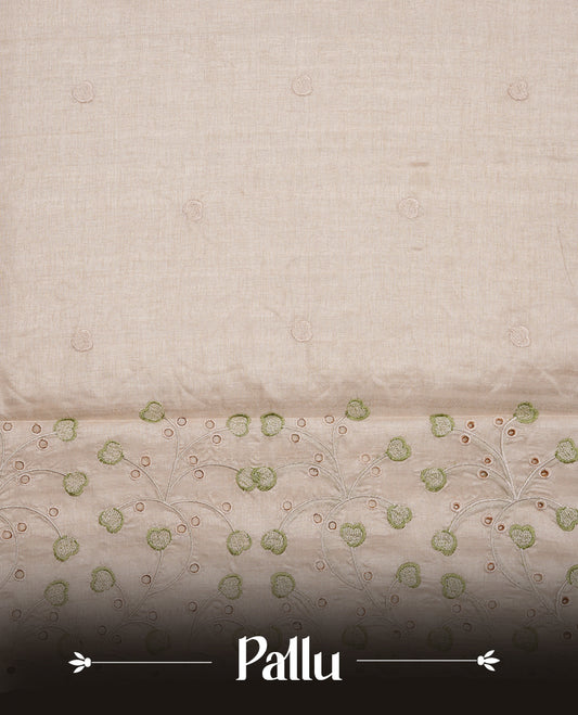 Beige colour Tussar silk saree featuring Elegant plain body, highlighting Green colour thread floral kodi worked scalp border, pallu and paired with matching blouse piece.