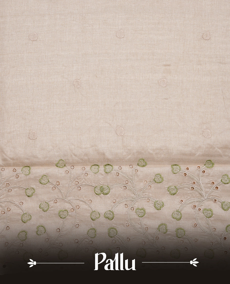 Beige colour Tussar silk saree featuring Elegant plain body, highlighting Green colour thread floral kodi worked scalp border, pallu and paired with matching blouse piece.