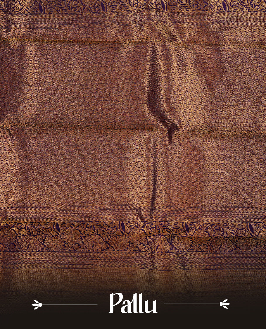 Indigo colour kancheepuram silk saree featuring gold zari floral kodi pattern on body, complemented by self colour with traditional border, paired with matching blouse piece.