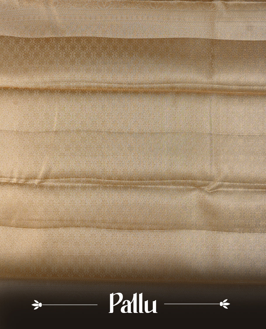Light Gold colour semi tissue silk saree featuring silver zari pattern on body, contrast gold colour with gold zari traditional border, paired with matching blouse piece.