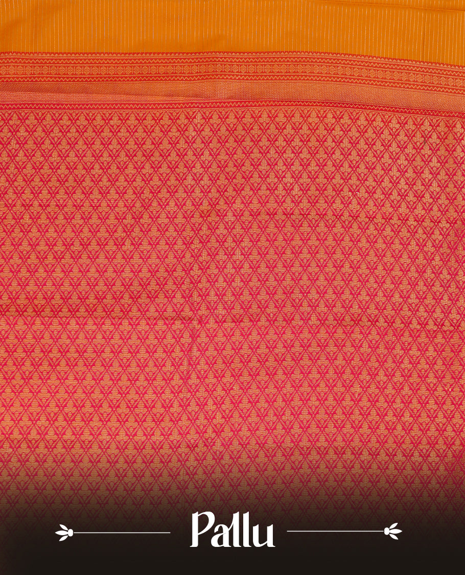 Mustard coloured soft silk saree featuring gold zari stripes and motifs across the body, enhanced with a contrast rani pink border and pallu, paired with a matching contrast blouse piece.