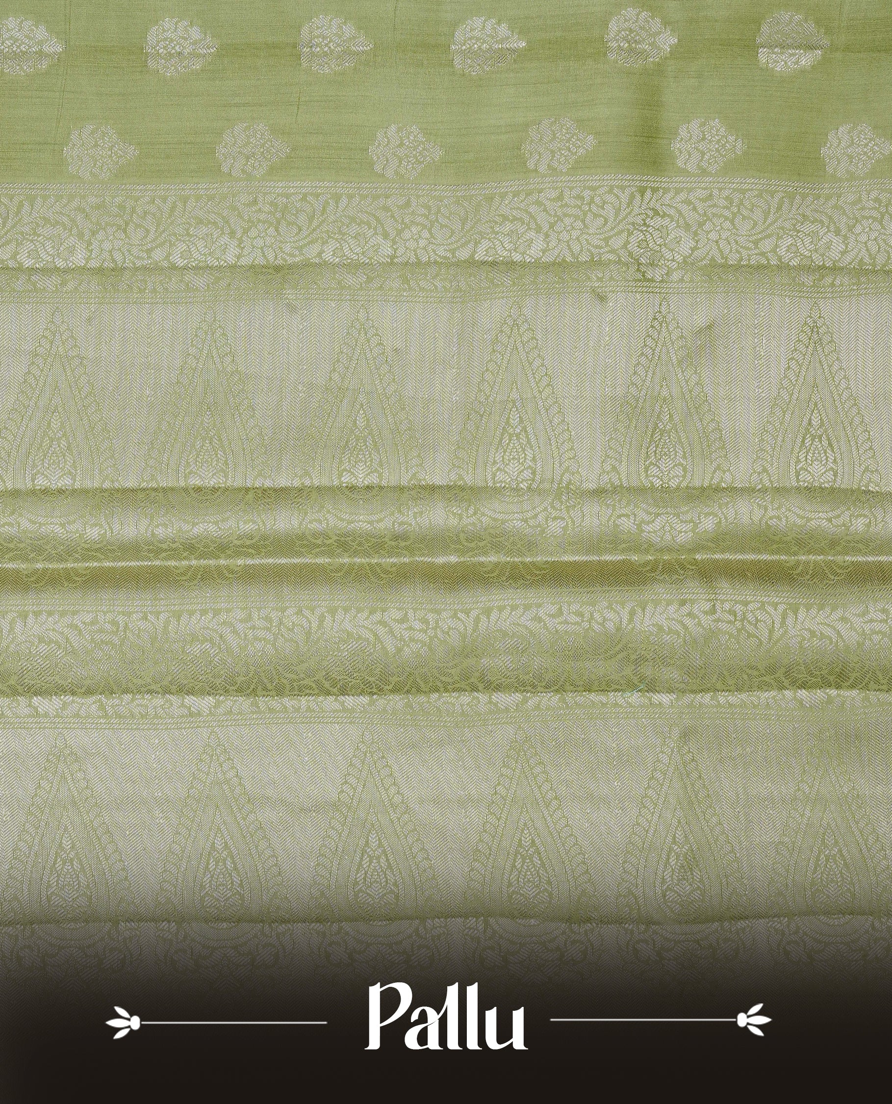 Pastel Gren Colour Tussar silk saree with silver zari buttas On Body, a Contrast  Self Coloured zari border and pallu, Paired With a matching blouse piece.