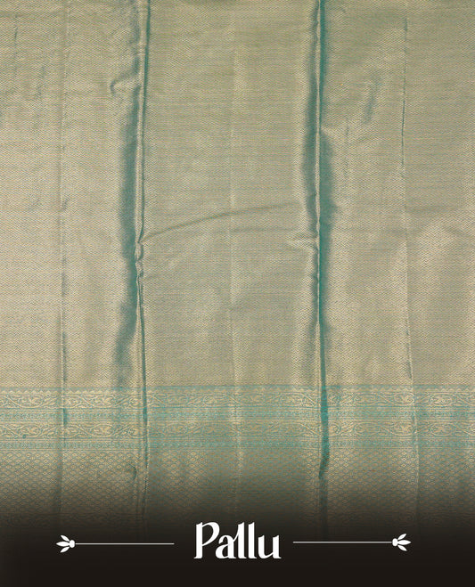 Green & Gold colour Double shade Semi tissue silk saree featuring self color kodi pattern on body, self colour with traditional border, paired with matching blouse piece.