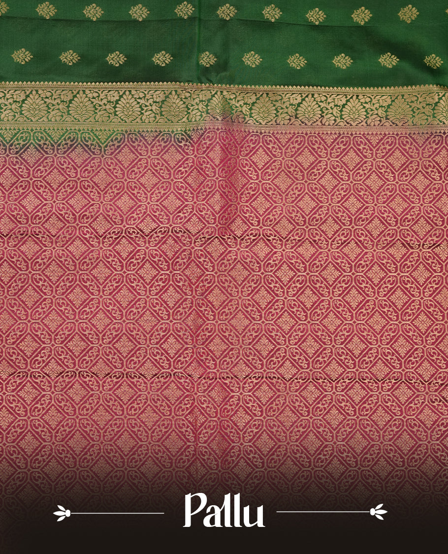 Green colour soft silk saree featuring gold zari motifs on the body, complemented by a contrast Maroon traditional zari border and pallu, paired with a matching blouse piece.