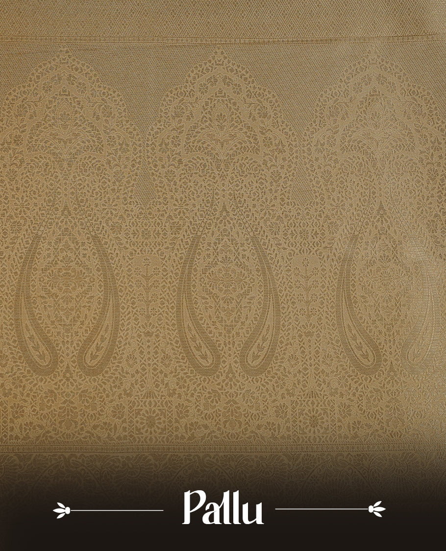 Cream colour soft silk saree featuring gold zari floral pattern on body, complemented by self colour with traditional border, paired with matching blouse piece.