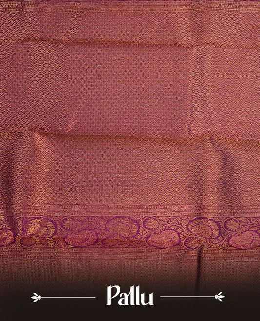 Purple colour kancheepuram silk saree featuring gold zari floral kodi pattern on body, complemented by self colour with traditional border, paired with matching blouse piece.
