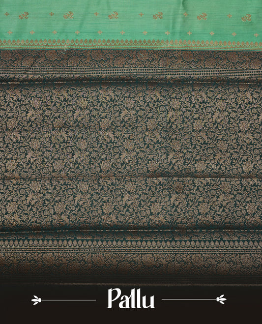 Teal colour Pure banaras soft silk saree featuring Antique zari motifs on body, contrast dark teal colour border , traditional pallu and paired with matching blouse