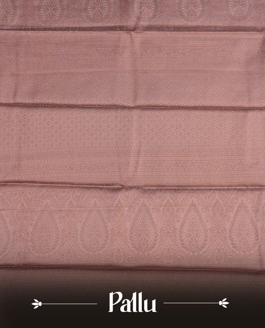 Copper colour semi tissue silk saree featuring copper zari pattern on body, selfcolour with gold zari traditional border, paired with matching blouse piece.