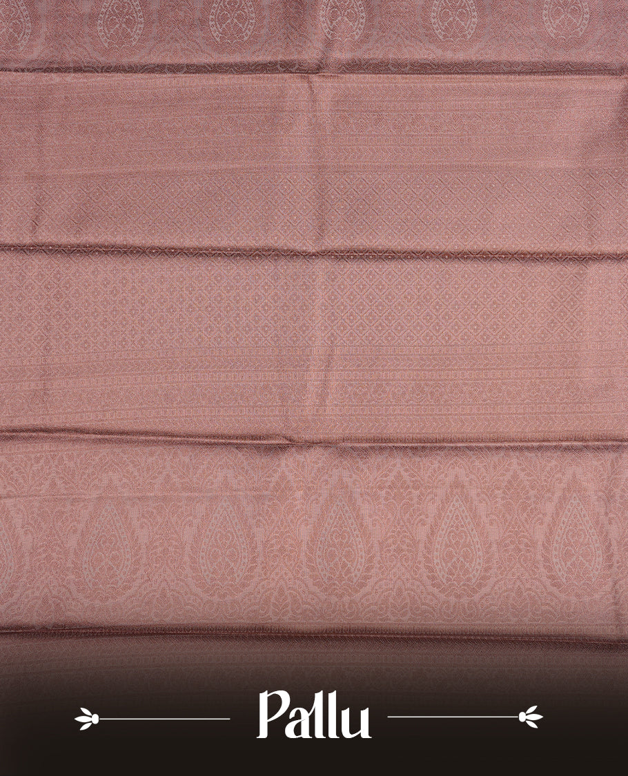 Copper colour semi tissue silk saree featuring copper zari pattern on body, selfcolour with gold zari traditional border, paired with matching blouse piece.