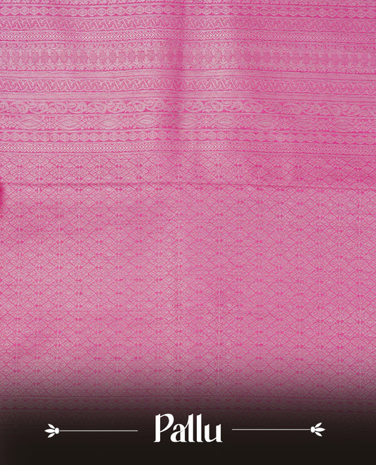 Magenta colour softie silk saree featuring silvar zari, rich pallu floral pattern brocade body, with contrasting self colour border.paired with matching blouse piece.