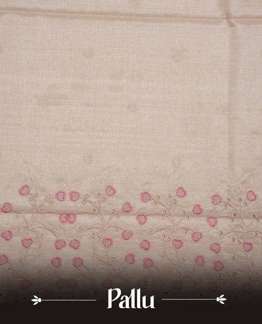 Beige colour Tussar silk saree featuring Elegant plain body, highlighting Mauve colour thread floral kodi worked scalp border, pallu and paired with matching blouse piece.