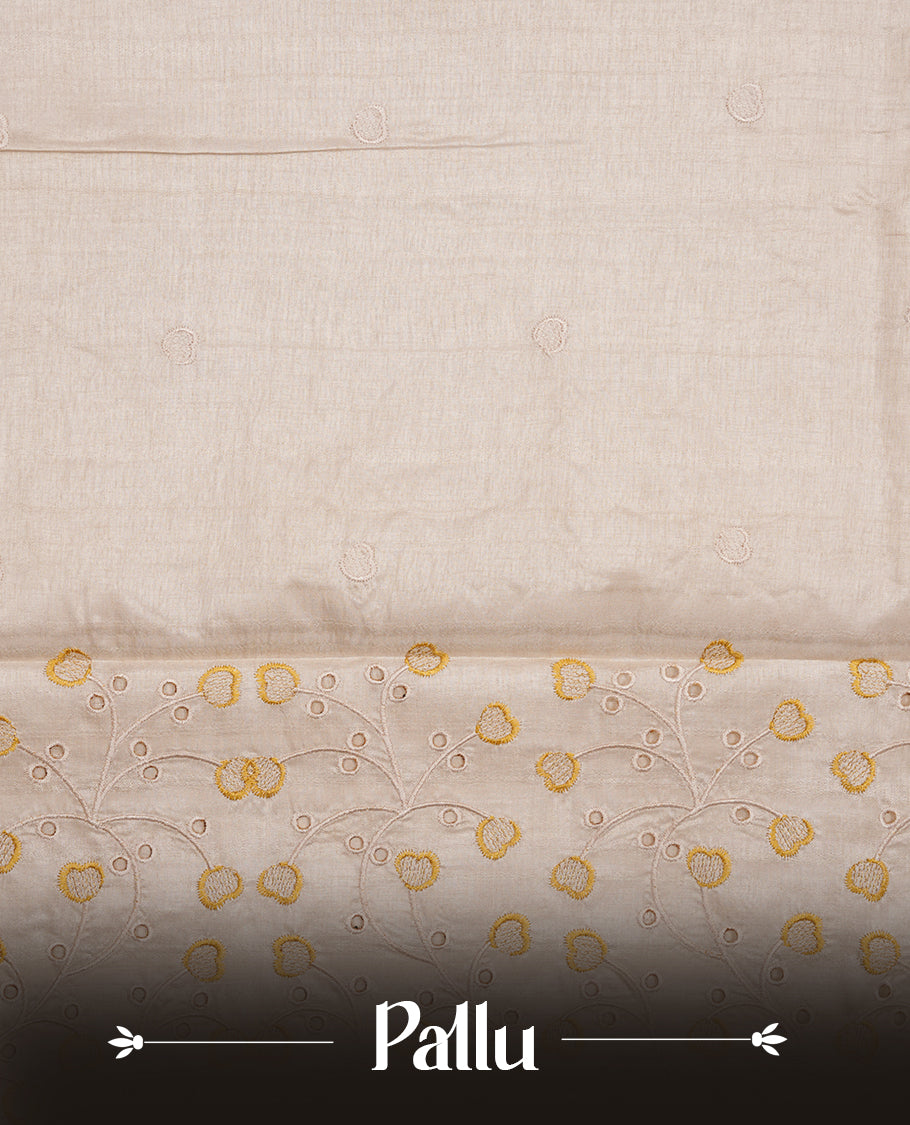 Beige colour Tussar silk saree featuring Elegant plain body, highlighting Yellow colour thread floral kodi worked scalp border, pallu and paired with matching blouse piece.