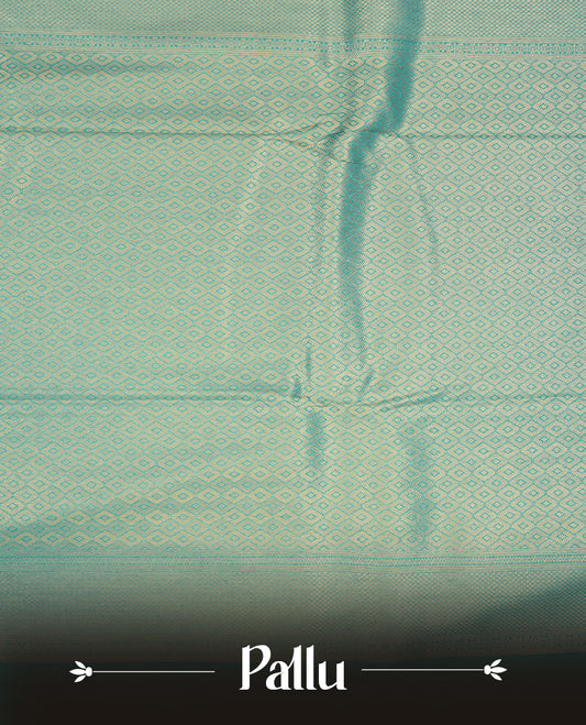 Aqua blue colour semi soft silk saree featuring gold zari motifs on across body, self colour border with traditional gold zari pattern, pallu and paired with matching blouse.