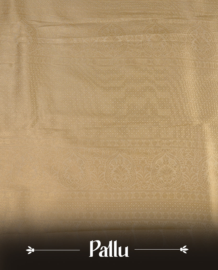 Cream colour soft silk saree featuring gold zari pattern on body, complemented by self colour with traditional border, paired with matching blouse piece.