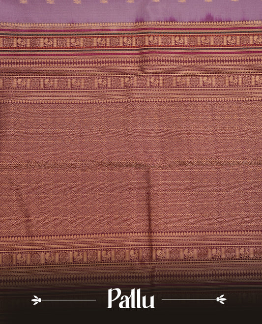 Lavender colour traditional kancheepuram silk saree featuring gold zari motifs on body, complemented by contrast multicolour with gold zari traditional border, paired with matching blouse piece.