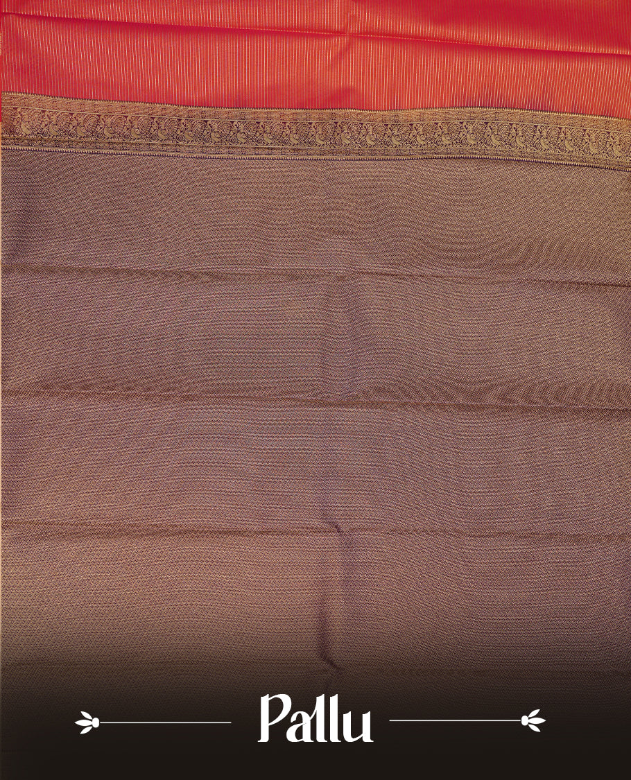 Rust orange coloured soft silk saree featuring gold zari stripes and motifs across the body, enhanced with a contrast Purple border and pallu, paired with a matching contrast blouse piece.
