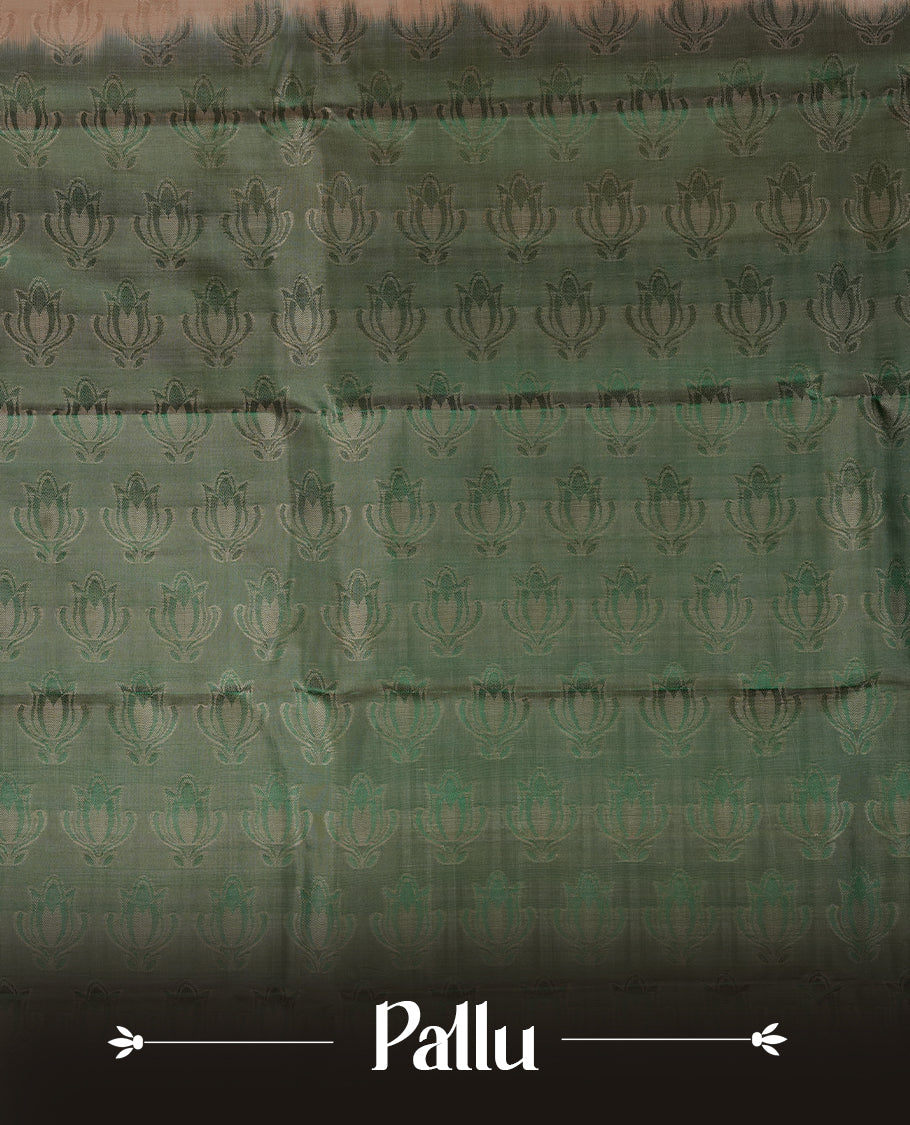 Cream colour soft silk saree featuring gold zari floral motifs on the body, complemented by a contrast green zari floral kodi border and pallu, paired with a matching blouse piece.