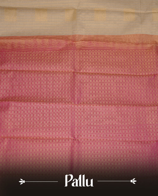Cream coloured soft silk saree featuring gold zari stripes and motifs across the body, enhanced with a contrast Magenta border and pallu, paired with a matching contrast blouse piece.
