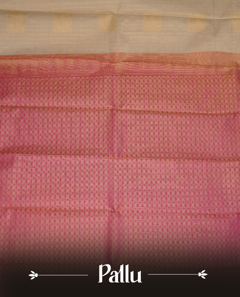 Cream coloured soft silk saree featuring gold zari stripes and motifs across the body, enhanced with a contrast Magenta border and pallu, paired with a matching contrast blouse piece.