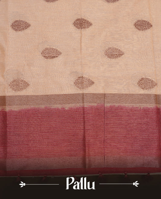 Cream colour semi linen silk saree featuring antique zari motifs on body, traditional border with contrast Deep red colour, pallu and paired with matching blouse