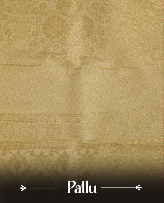 Orange coloured soft silk saree featuring gold zari stripes and motifs across the body, enhanced with a contrast Cream border and pallu, paired with a matching contrast blouse piece.