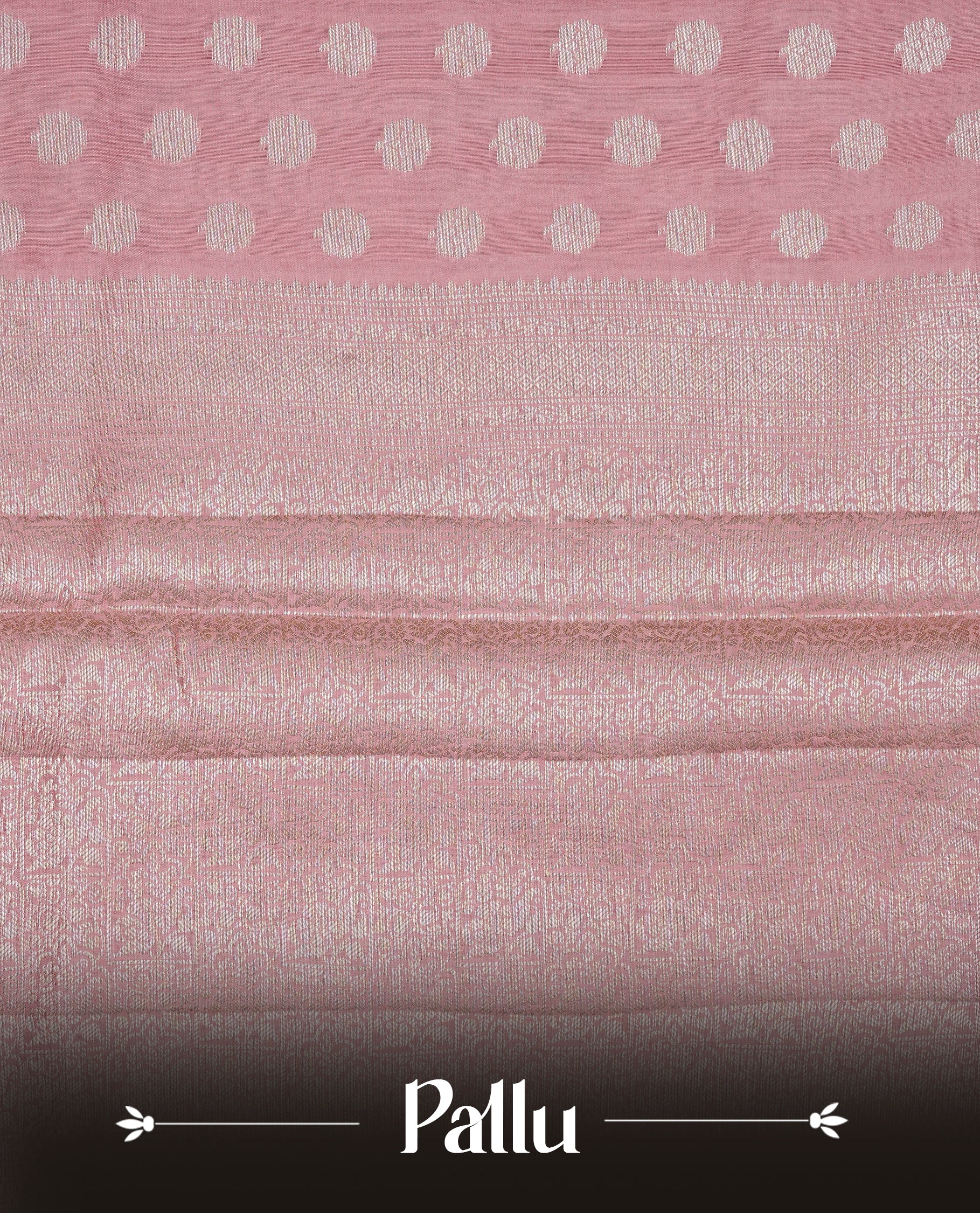Peach Pink Colour Tussar Silk Saree with silver zari buttas on the body, an elegant silver zari border and intricately designed pallu, paired with a matching blouse piece.