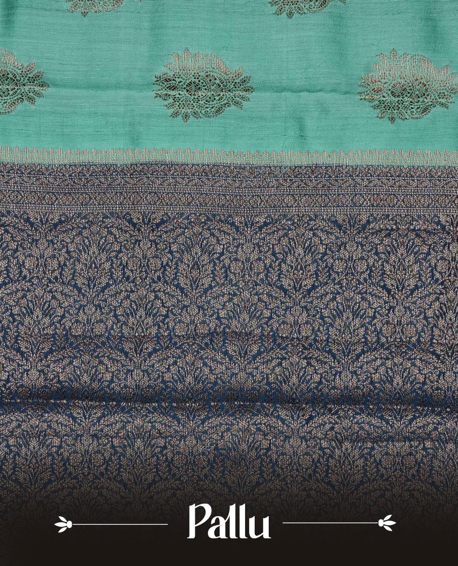 Pastel Aqua Green Colour Tussar Silk saree with elegant antique zari floral motifs On Body, a contrasting Peacock blue zari border, a rich zari pallu, Paired With a matching  blouse piece.