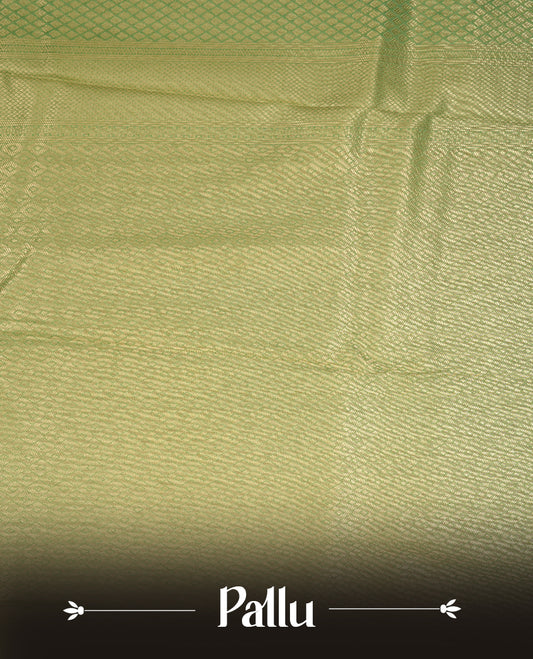 Pastel green colour semi soft silk saree featuring gold zari motifs on across body, self colour border with traditional gold zari pattern, pallu and paired with matching blouse.