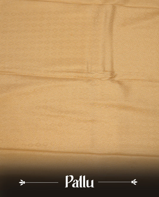 Light gold colour semi soft silk saree featuring gold zari motifs on across body, self colour border with traditional gold zari pattern, pallu and paired with matching blouse.