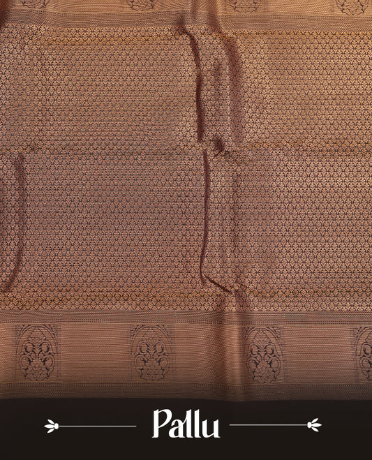 Mustard colour traditional kancheepuram silk saree featuring gold zari motifs on body, complemented by contrast black colour with gold zari traditional border, paired with matching blouse piece.