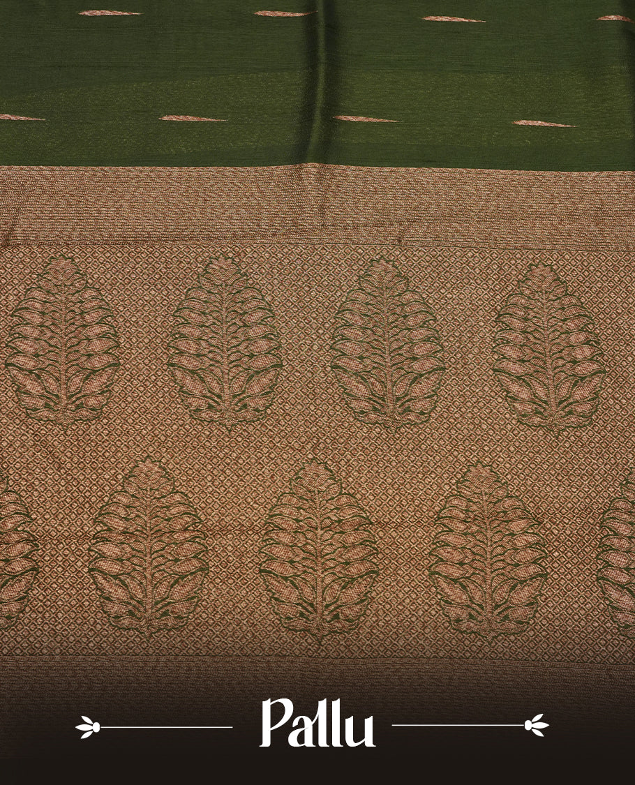 Dark green colour semi banaras tussar georgette saree featuring antique gold zari buttas on body, temple pattern on border and floral pattern on pallu, paired with matching blouse piece.