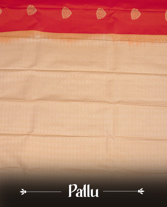 Red coloured soft silk saree featuring gold zari motifs across the body, enhanced with a contrast Cream border and pallu, paired with a matching contrast blouse piece