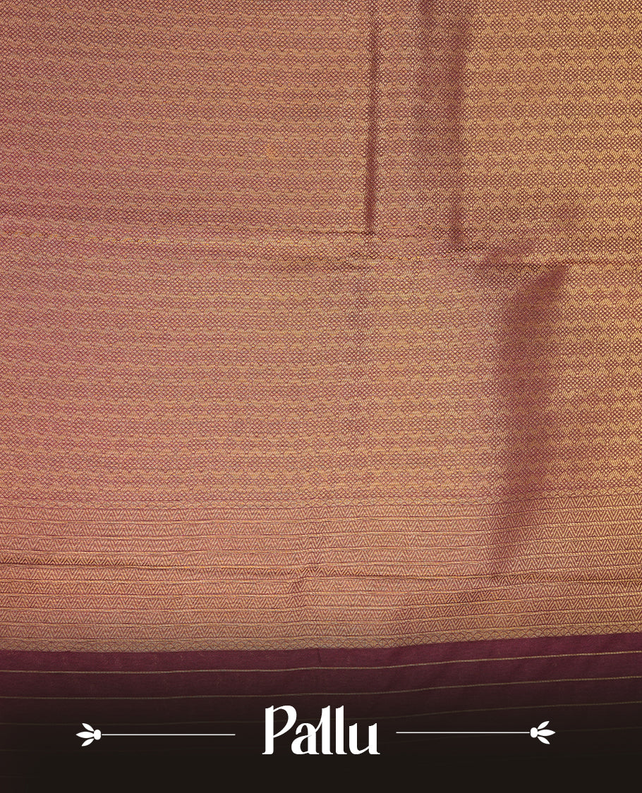 Lavender colour semi soft silk saree featuring gold zari motifs on across body, self colour border with traditional gold zari pattern, pallu and paired with matching blouse.