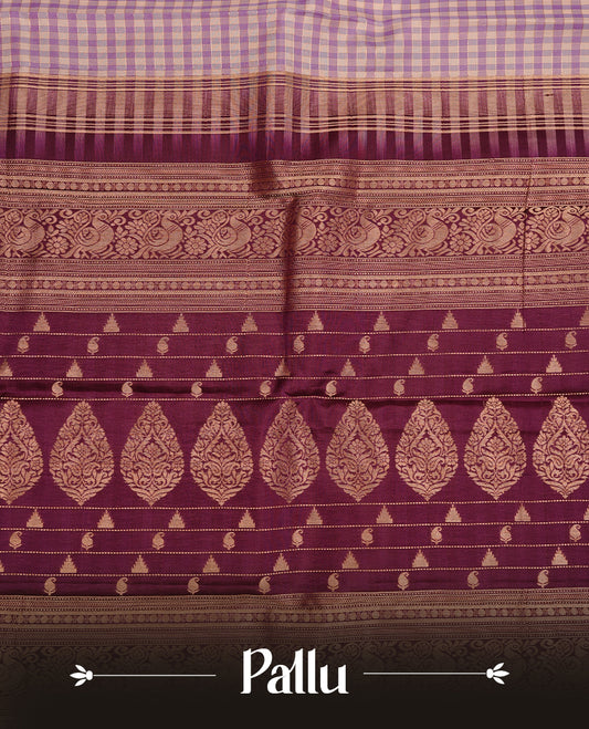 Lavender & Purple colour traditional kancheepuram silk saree featuring gold zari check pattern on body, complemented by contrast purple colour with gold zari traditional border, paired with matching blouse piece.