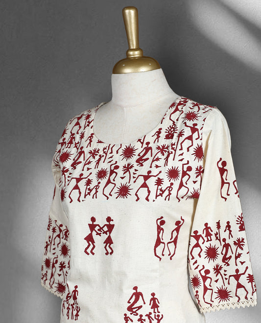 Off white colour cord set with deep maroon Warli inspired print, featuring a round neck top with elbow length sleeves and side slits, paired with matching straight fit pants.