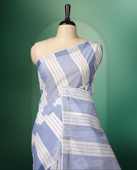 White and light blue colour striped cotton saree featuring a sleek, borderless design for a modern look, paired perfectly with a matching blouse for effortless style.