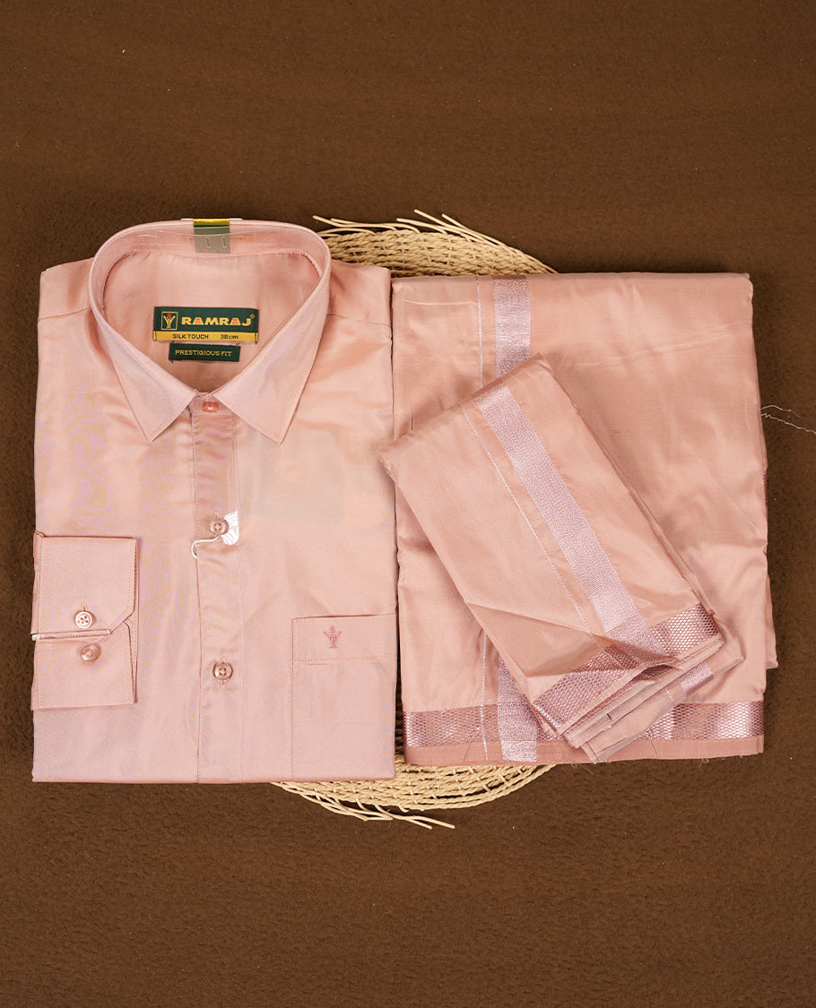 RAMRAJ  Pink Colour kurtha paired with a pink dhoti and a pink towel, elegantly finished with a matching Rose Gold border.