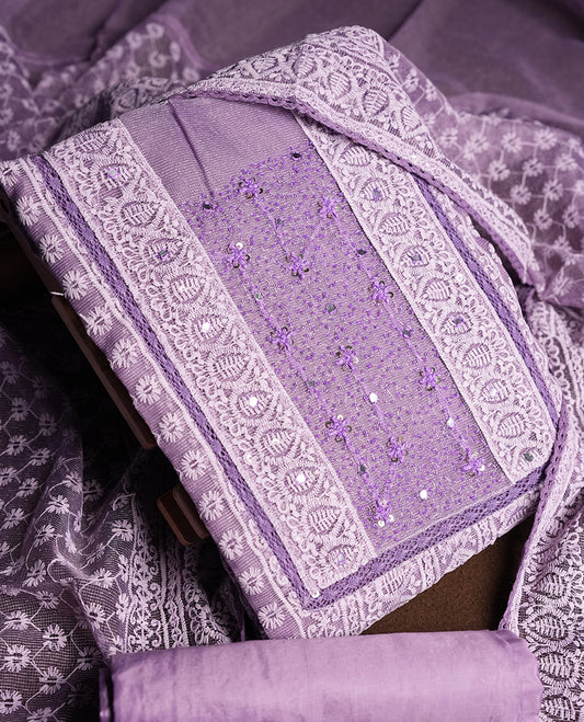 Lavender Churidar Material featuring Intricate Thread Embroidery with Mirror and Cut Beads Work on the Front Panel, paired with an All Over Embroidered Net Dupatta and Matching Bottom