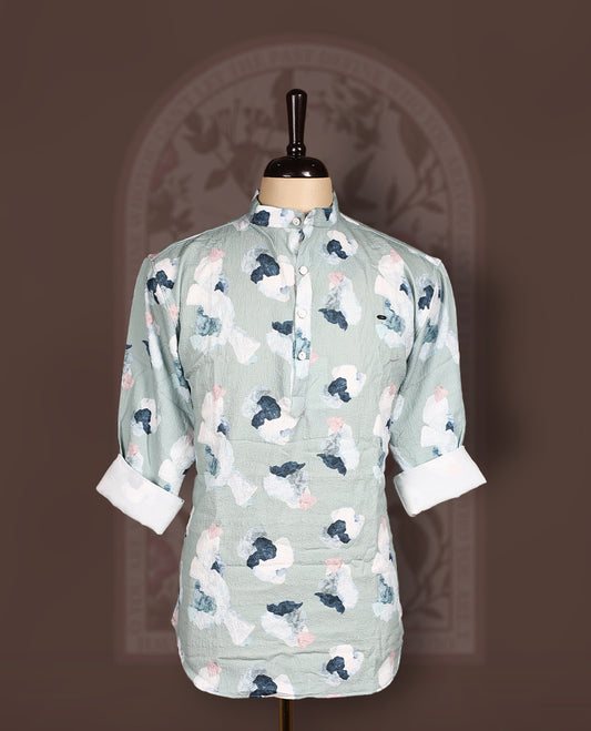 Pastel green colour short kurta in crush fabric with digital floral print, Features a mandarin collar and full sleeves, Lightweight, modern, and perfect for casual or semi-formal occasions.