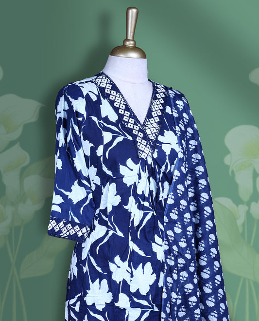 Dark blue colour churidar set featuring elegant white mirror on the neckline, sleeves, and white printed pattern across the body, Paired with a matching printed dupatta