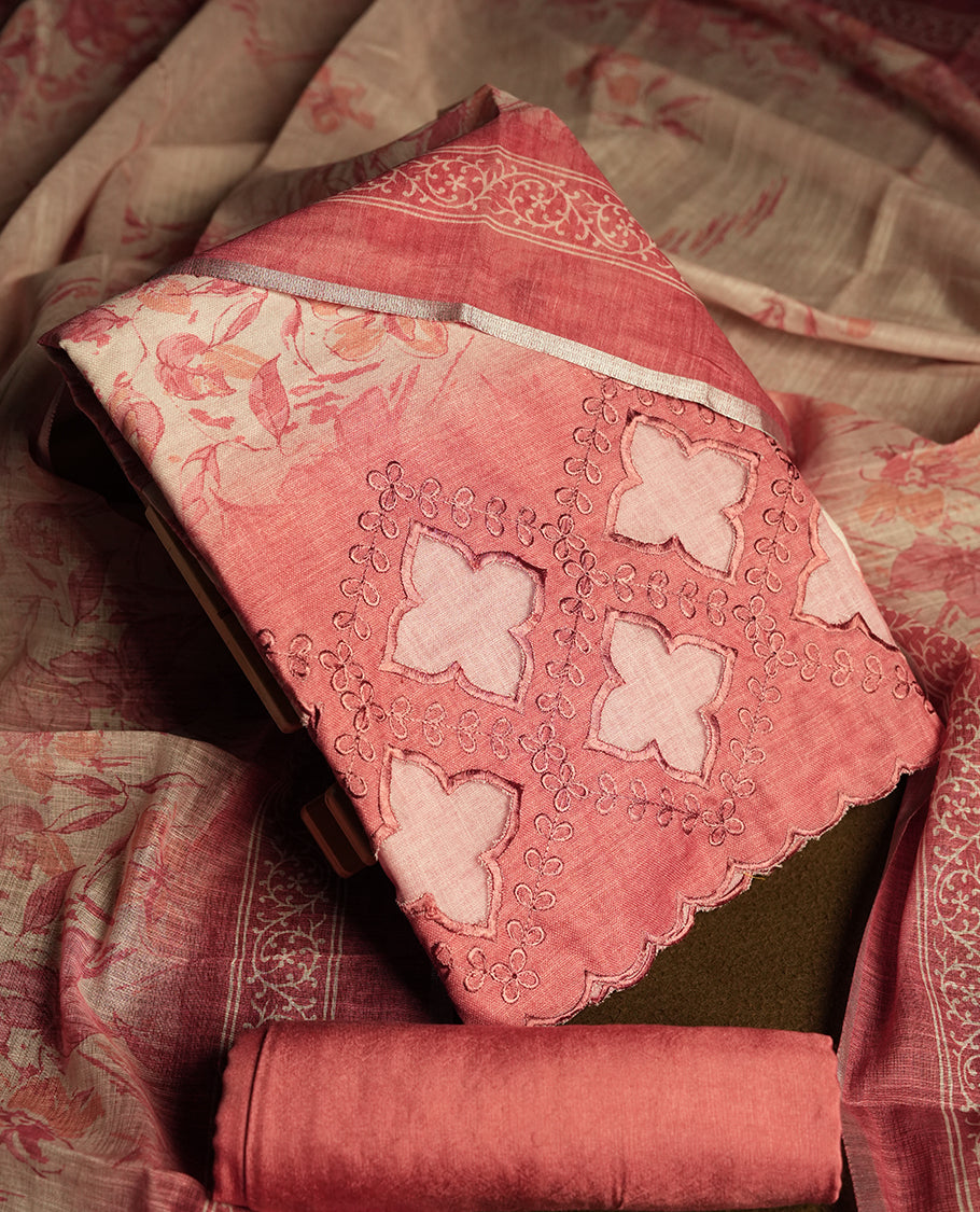 Rose Pink colour churidhar material featuring cutwork and thread embroidery on the front panel, floral digital printed dupatta with elegant border, and matching plain bottom.