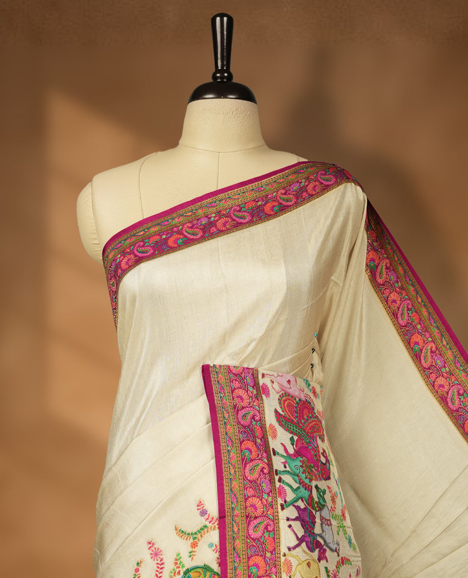 Cream Pashmina Silk Saree with Plain Body, Vibrant Multicolor Embroidered Elephant, Peacock, and Horse Motifs on Pink-Green Zari Border & Grand Pallu, Paired with Matching Blouse Piece