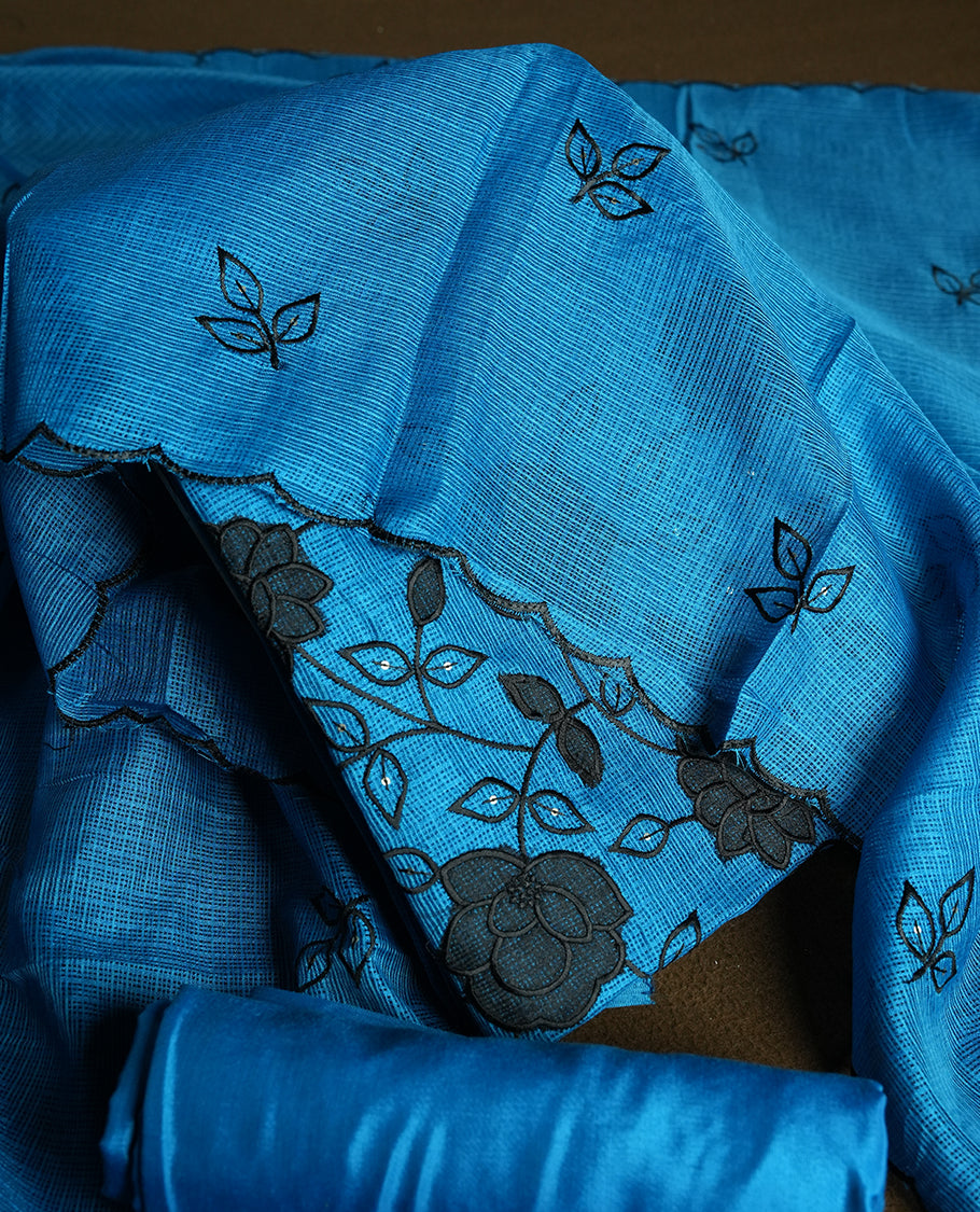 Blue colour churidhar material featuring Black colour thread embroidery on the front panel, self colour dupatta with elegant border, and matching plain bottom